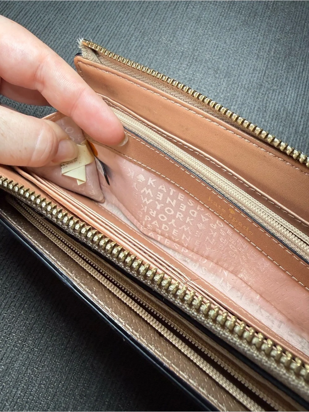 Kate spade Metallic Rose Gold Wristlet Wallet with Zip Closure